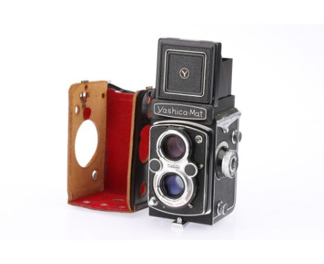 A Yashica-Mat Medium Format TLR Camera, black, body G, shutter working, optics G-VG, in half-case,