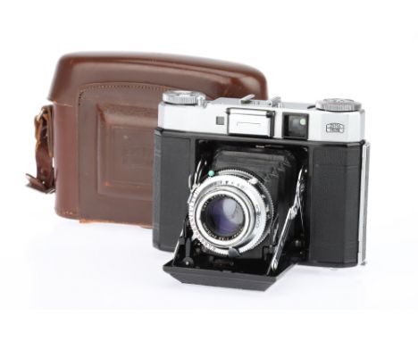 A Zeiss Ikon Super Ikonta IV 534/16 Folding Rangefinder Camera 1956-60, 6 x 6cm format, with a Carl Zeiss Tessar f/3.5 75mm l