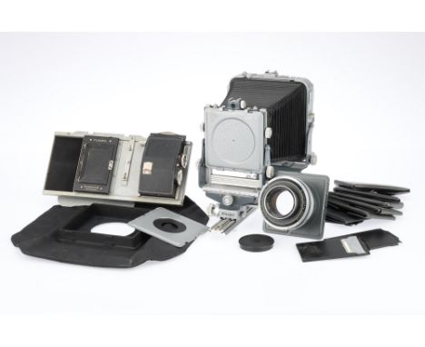 A Plaubel Pico Junior Monorail Large Format System Camera, grey, body G-VG, with 4x5 back, repeating back, blank lensboard, &