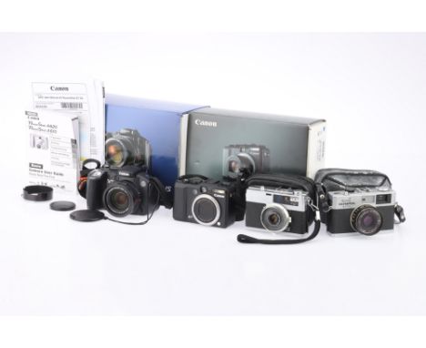 Four Compact Cameras comprising a Canon PowerShot G7 compact digital camera with an f/2.8-4.8 7.4-44.4mm IS zoom lens, with r