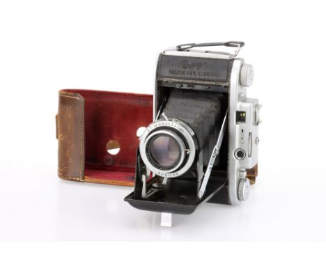 An Ensign Selfix 820 Special Medium Format Folding Camera chrome, circa 1953, with a Ross Xpres f/3.8 105mm lens, shutter sti