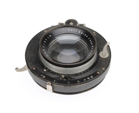 A Carl Zeiss Jena Tessar f/6.3 30cm Camera Lens, in Compound shutter, body G-VG, shutter working, optics G-VG, some light dus