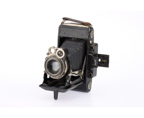 A Zeiss Ikon 530/2 Medium Format Folding Camera, black, body F-G, shutter working signs of heavy use, bellows G, RF patch bri