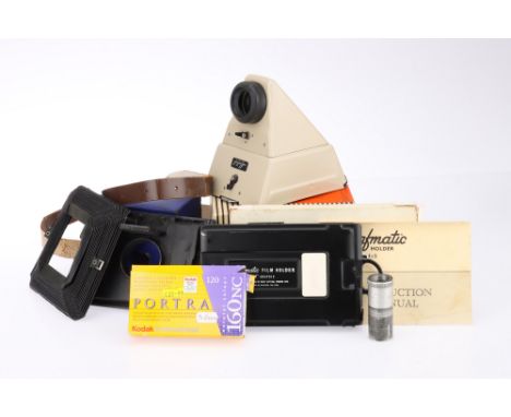 A Small Selection of Large Format Accessories comprising a Linhof Reversal Mirror Attachment in maker's box, a Wray Grafmatic