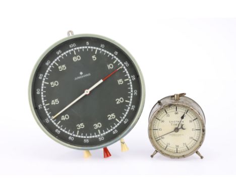 Two Darkroom Stop Clocks comprising a Junghans wall stop clock, calibrated 0-60 seconds and minutes, winds up and runs, also 