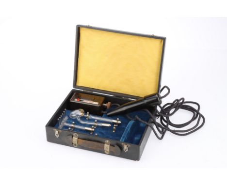 A Cased Everay High Frequency Violet Ray Type 'Ideal' Vanity Set, to include attatchments such as a comb, a flat bulb attachm