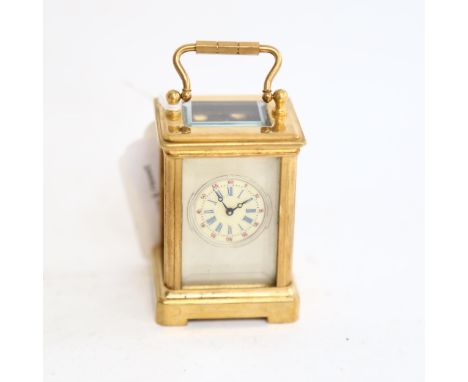 A reproduction miniature brass-cased carriage clock, height 6cm 
