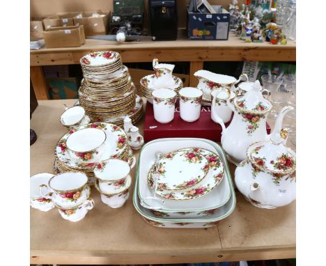 A part-service of Royal Albert Old Country Roses tea and dinnerware, to include teapot, coffee pot, 6 dinner plates, 7 cups a