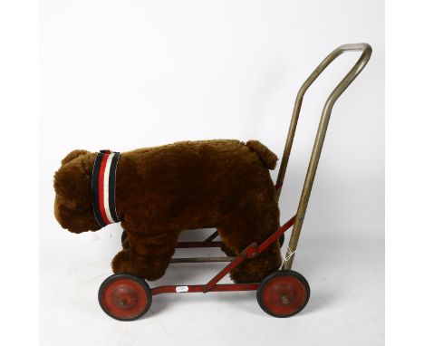A child's Vintage push-along bear toy, possibly Steiff, length 50cm 