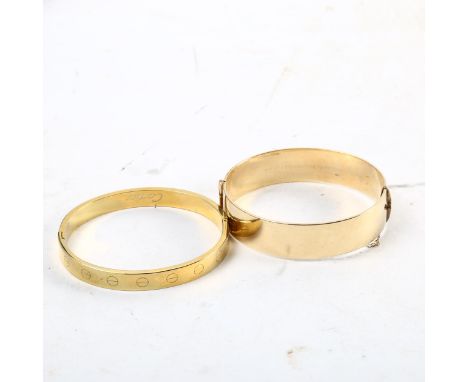 A 9ct rolled gold engraved bangle, and a gilded bangle 
