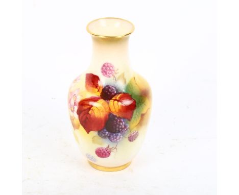 A 1940s Royal Worcester vase, painted with autumnal leaves and berries by K Blake, signed, shape 2491, date code 1154, height