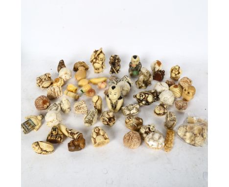 A quantity of bone, vegetable ivory and resin netsuke and figures 