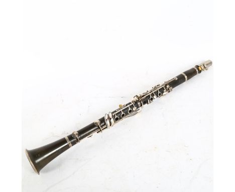 A Chinese Hsinghai 4-section clarinet, cased 