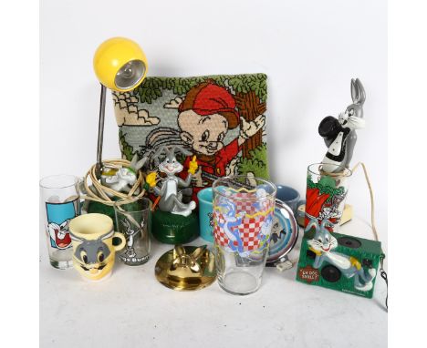 A collection of Bugs Bunny memorabilia, including clock, stick telephone, mugs etc 