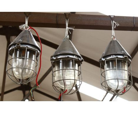 A set of 3 polished metal bulkhead lantern, Honex glass bowls, length 40cm 