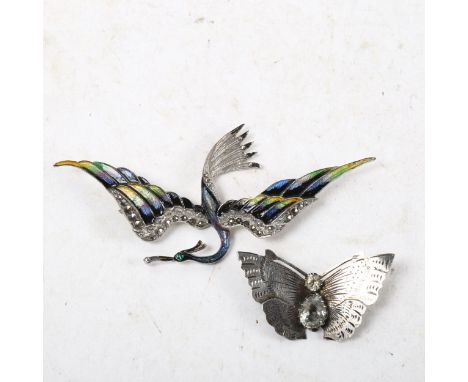 A silver and stone set butterfly design brooch, and a Continental silver and enamel swallow design brooch (2) 
