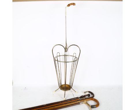 A novelty umbrella stick stand, containing various walking sticks and canes, including Duke of Wellington Regiment swagger st