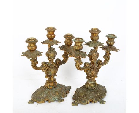 A pair of French Rococo style cast-brass 3-light table candelabra, height 26cm 