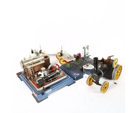 A Wilesco of Germany steam engine toy electric light, and steam engine kit, also included are 2 Mahmood steam engines shells 