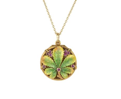 A French enamel and ruby vinaigrette pendant, the circular hinged vinaigrette applied with a cluster of leaves, heightened wi