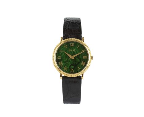 A wristwatch by Piaget, the circular green hardstone dial with gilt Roman numerals and tapered hands, to a calibre 9P jewelle
