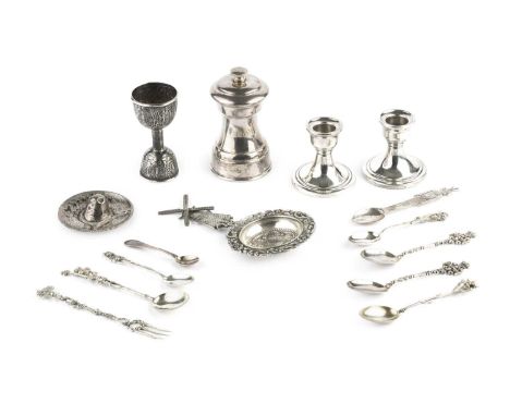 A collection of silver, comprising a pepper grinder, by Marston &amp; Co, Birmingham 1995, a pair of dwarf candlesticks, on w