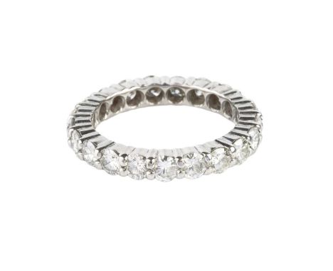 A diamond full hoop ring, claw set throughout with round brilliant-cut diamonds, white precious metal mounted, total diamond 