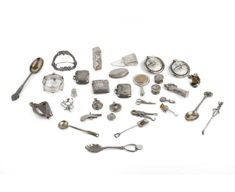 A collection of small silver items, comprising three vesta cases, a lipstick case, stamped 800, a small oval box with wood in