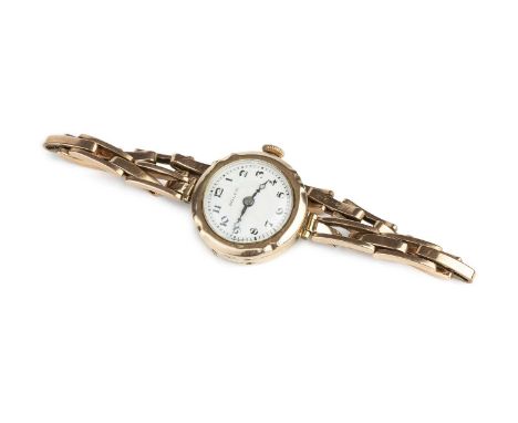A lady's 9ct gold cased bracelet watch by Rolex, the circular white enamel dial with black Arabic numerals, to a jewelled man