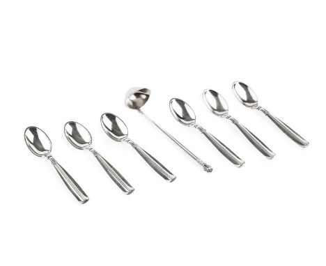 A Danish silver acorn pattern cream ladle, by George Jensen, import marks for London 1925, 14cm long; and a set of six Danish