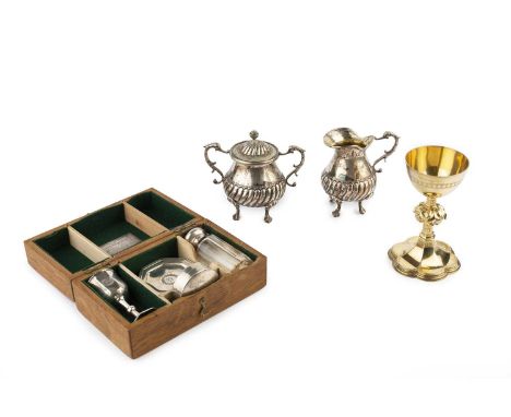 An early Victorian silver-gilt small chalice, with knopped and faceted column, and hexafoil base, by John Keith, London 1854,