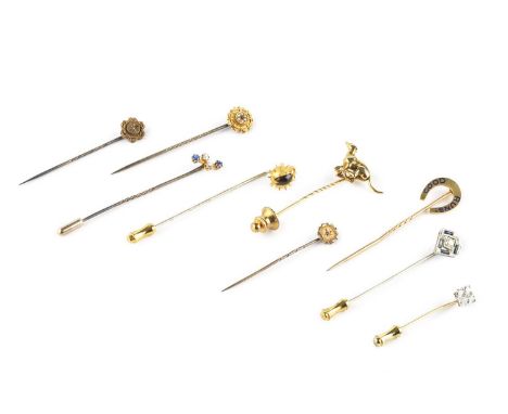 A collection of stick pins, comprising a diamond cluster stick pin, with four round brilliant-cut diamonds in claw setting, a