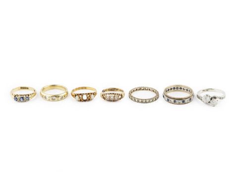 A collection of antique and later dress rings, comprising a diamond set band ring, 18ct gold mounted, a sapphire and diamond 