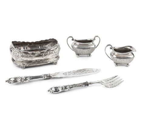 A late Victorian silver sucrier and milk jug, of half lobed form, by James Dixon &amp; Sons, Sheffield 1898, a pair of mid Vi