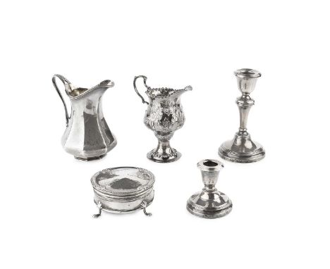 A George III silver pedestal cream jug, with punched borders and embossed with swags of foliage, maker's mark indistinct, Lon