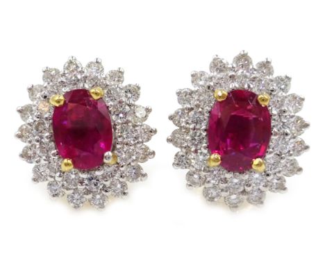 Pair of 18ct gold ruby and diamond cluster stud ear-rings, rubies approx 2.2 carat, diamonds approx 2.25 carat Condition Repo