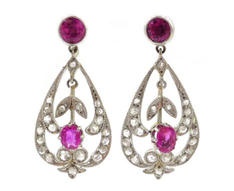 Pair of 18ct white gold ruby and diamond pendant ear-rings Condition Report Gold tested 18ct, pendant length = 3cmClick here 