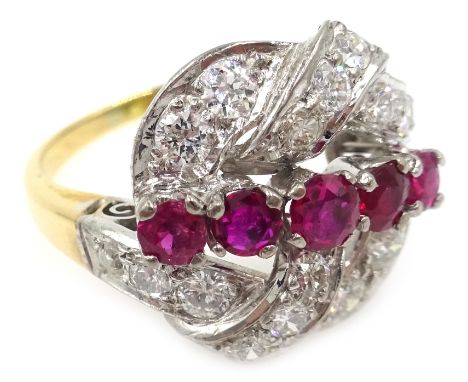 Ruby and diamond scroll ring, five graduating central rubies with diamond surround, unmarked Condition Report Approx 5.6gm, s