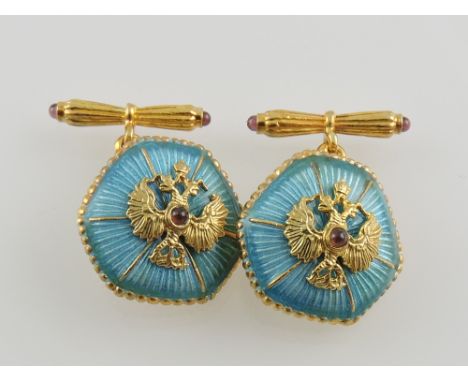 A pair of gilt cufflinks, stamped 925, with octagonal turquoise enamel buttons set with a double-headed eagle, marked PMYM, 1