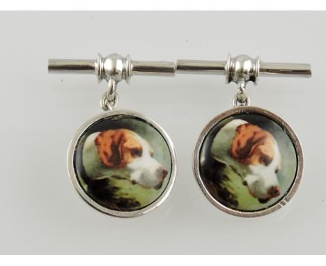 A pair of circular silver chain and bar cufflinks decorated with beagle heads.
