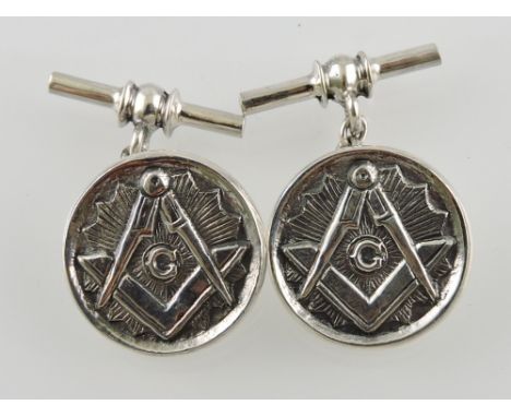 A pair of circular silver chain and bar cufflinks embossed masonic symbols.