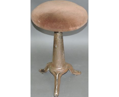 An early 20th Century Singer style industrial steel stool with revolving adjustable seat on tripod base.