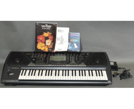 A Casio CTK 811 electronic organ.