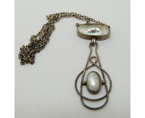 An Art Nouveau silver necklace set with pearl cabochons in the Liberty style, 4.7cm