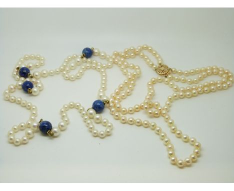A two strand pearl necklace with a 14ct gold clasp and a pearl necklace set with lapis lazuli beads 
