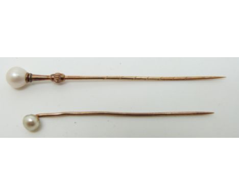 Two Victorian stick pins set with a pearl to each