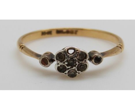 A 9ct gold ring set with diamonds in a flower cluster, 1.5g (size O)