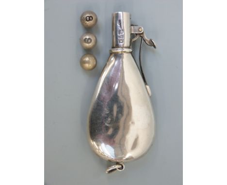 A George V hallmarked silver novelty shooting butt marker formed as a shot or powder flask, Chester 1912 maker Grey & Co. tog