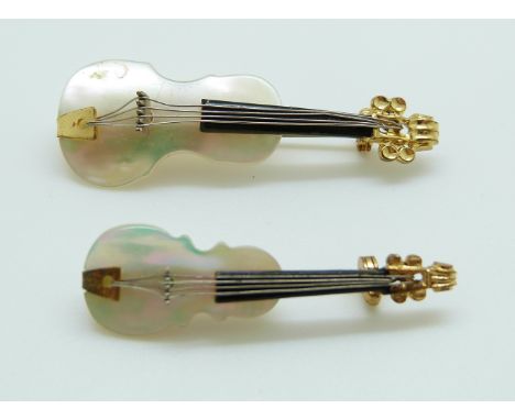 Two brooches in the form of violins set with mother of pearl, 5cm & 4cm
