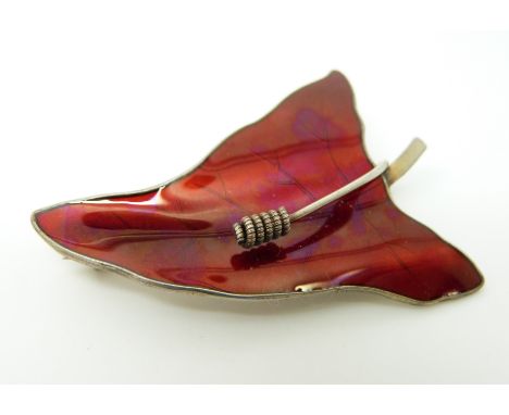 A Norwegian silver brooch set with red enamel in a leaf decoration 5.5 x 3.5cm